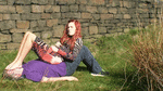 Slave serves as a lounger for smoking mistress